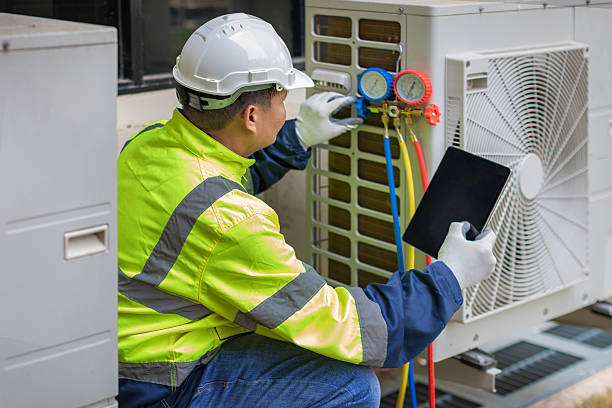 Professional Heat Pump Repair technician working in Hood River, OR